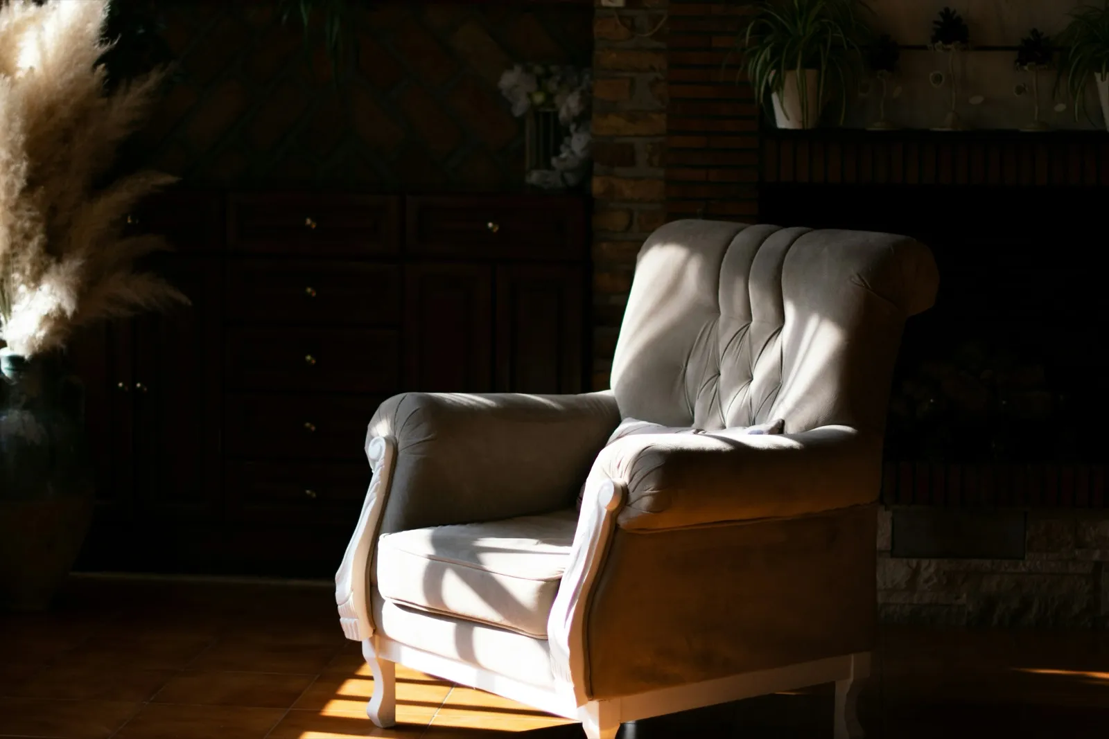 Sunlit armchair in a warm room
