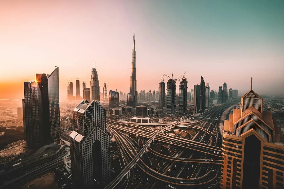 Aerial photo of city highway surrounded by high-rise buildings in Dubai